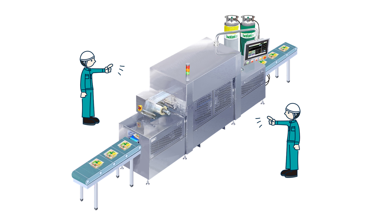 Two workers wearing helmets are monitoring the operation of a packaging machine.